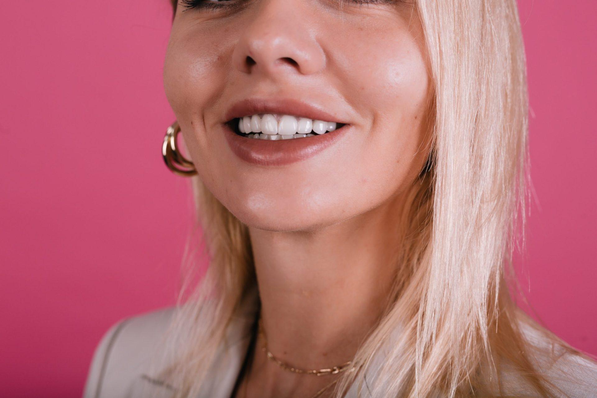 close portrait of women s perfect smile with whitesnow smile veneers and big beautiful lips