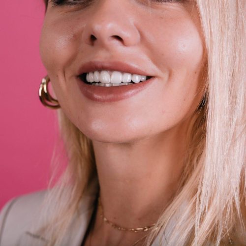 close portrait of women s perfect smile with whitesnow smile veneers and big beautiful lips